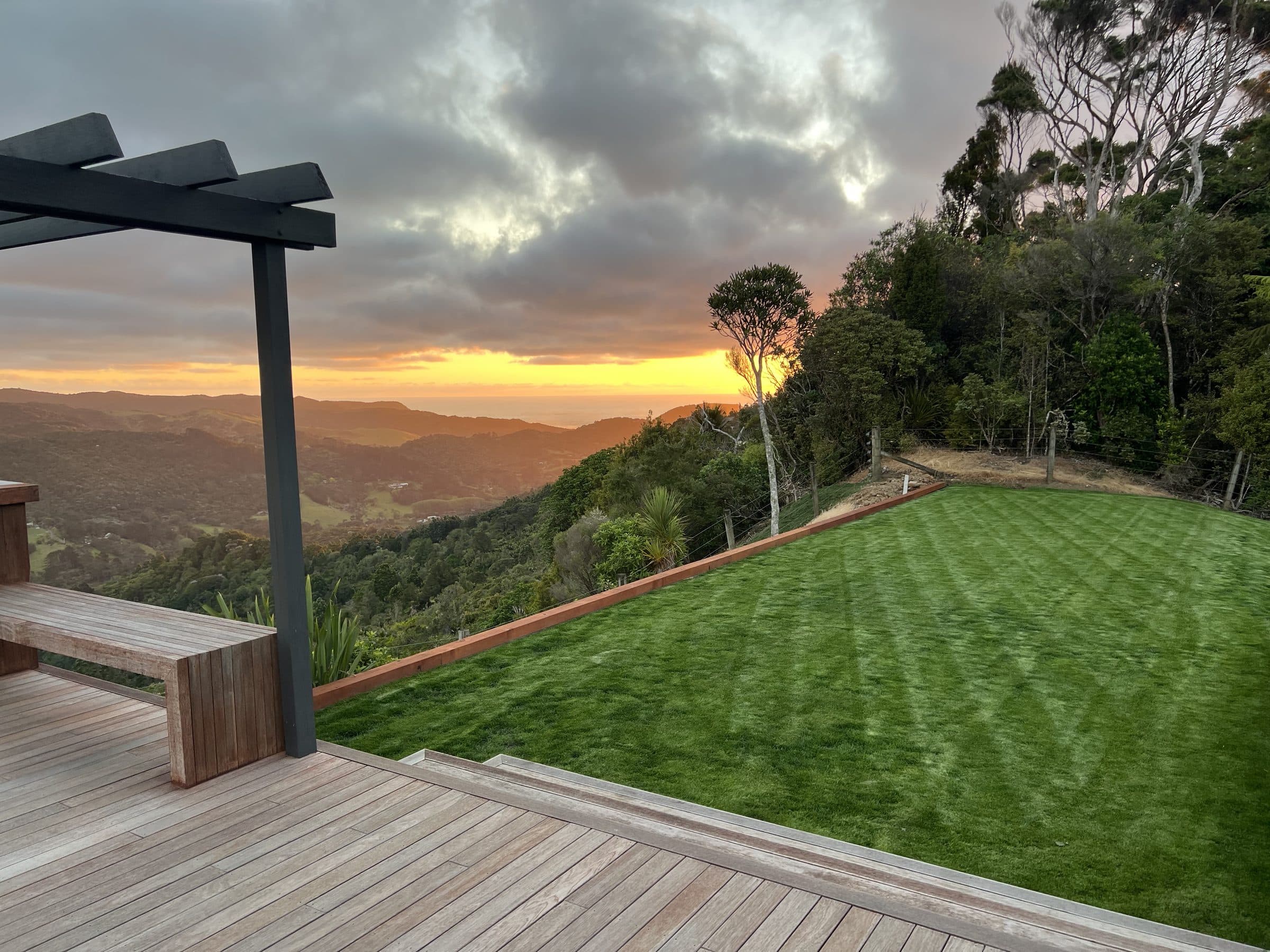 A freshly mown residential lawn in Auckland at sunset
